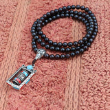 Prayer Wheel Garnet Stone Mala